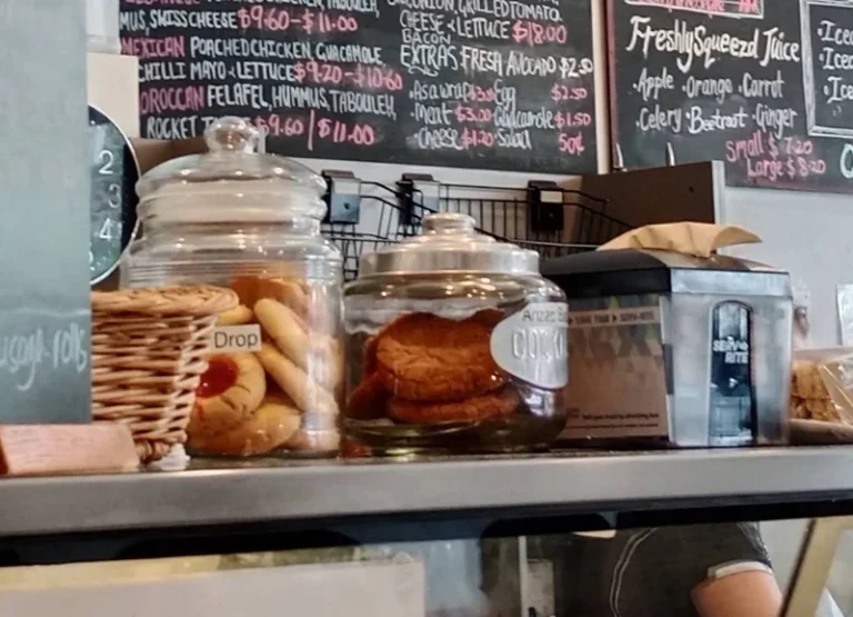 Cookie jars and baked treats on the counter at Cafe D’lish
